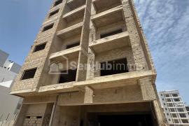 IMMEUBLE R+6 À VENDRE EN L'ÉTAT – OPPORTUNITÉ INVESTISSEUR À SOCABEG Ngor Almadie